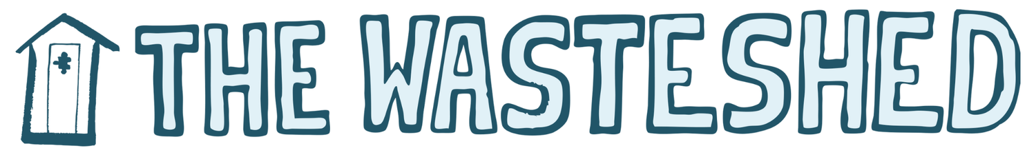 Hand-drawn logo with the words THE WASTESHED in large, bold letters and a simple outline of a shed with a plus sign inside it on the left.