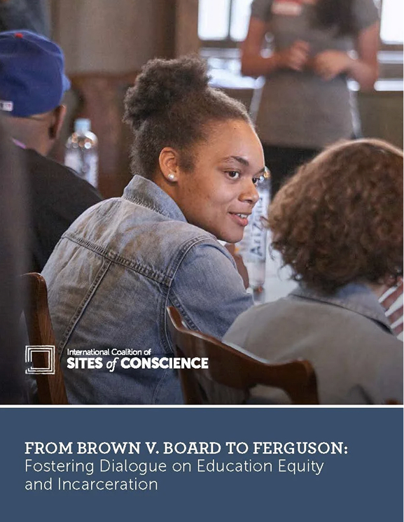 Woman looking at another woman while sitting in classroom