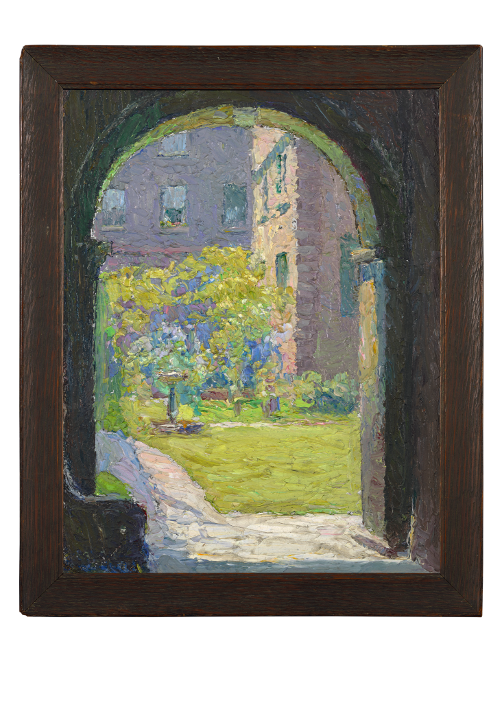 An impressionist painting framed in dark wood shows a sunlit garden with flowers and greenery, viewed through a shaded stone archway, with a path leading into the bright courtyard.